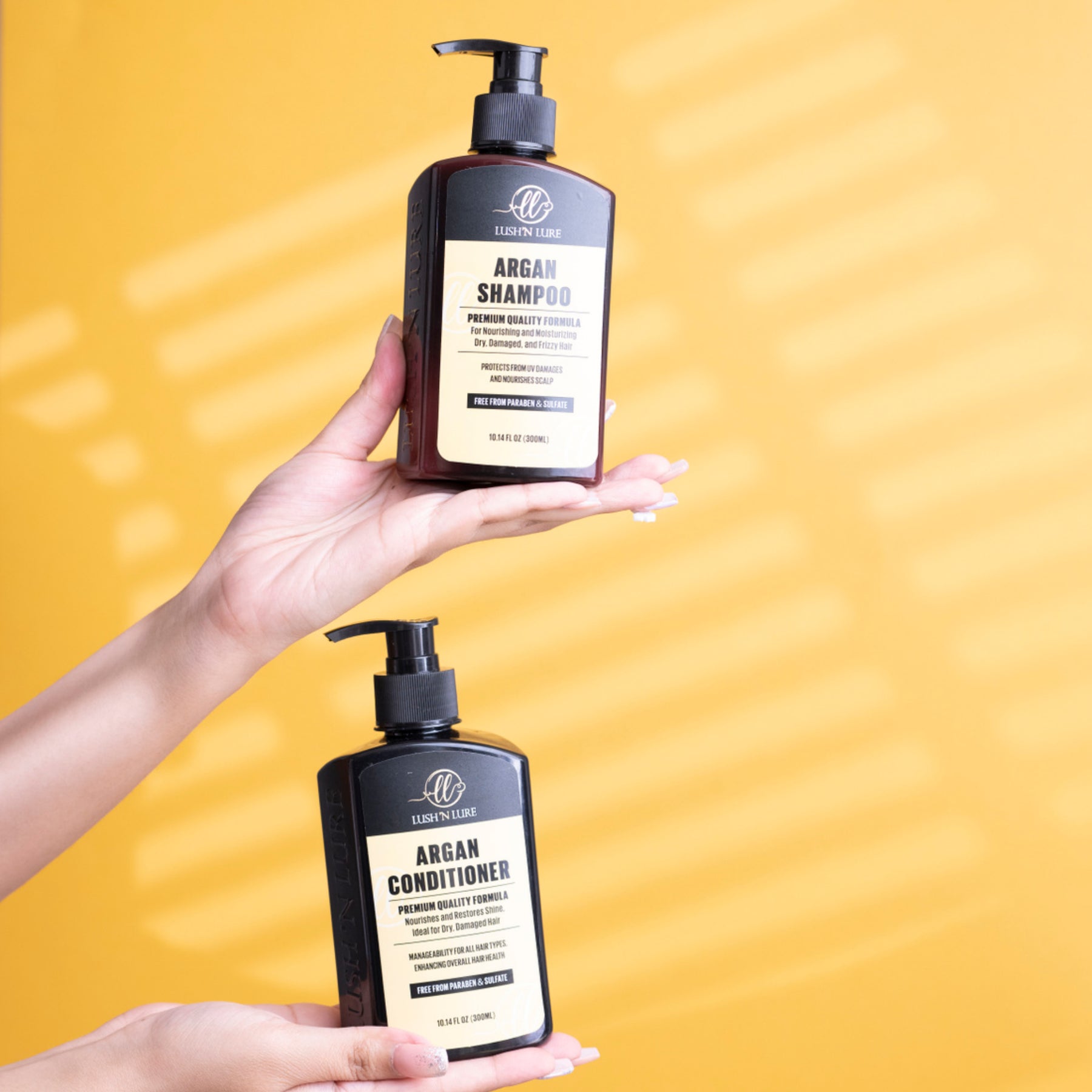 "Model applying LUSHNLURE Argan Shampoo and Conditioner, demonstrating the luxurious, nourishing formula. The products work together to cleanse and hydrate the hair, leaving it soft, shiny, and deeply moisturized with a healthy glow."