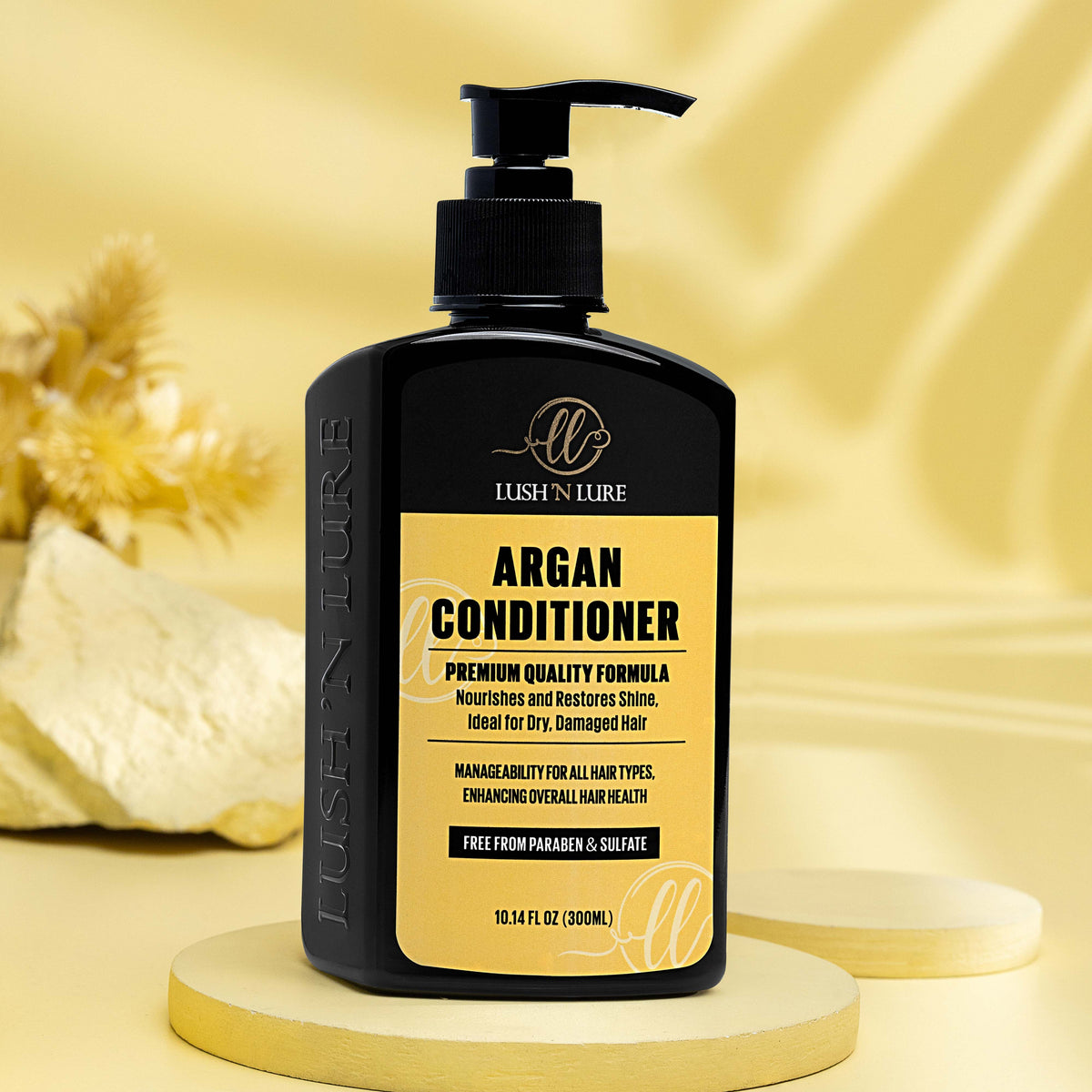 "LUSH 'N LURE Argan Conditioner displayed elegantly with a smooth backdrop, showcasing its hydrating formula designed to nourish and soften hair."