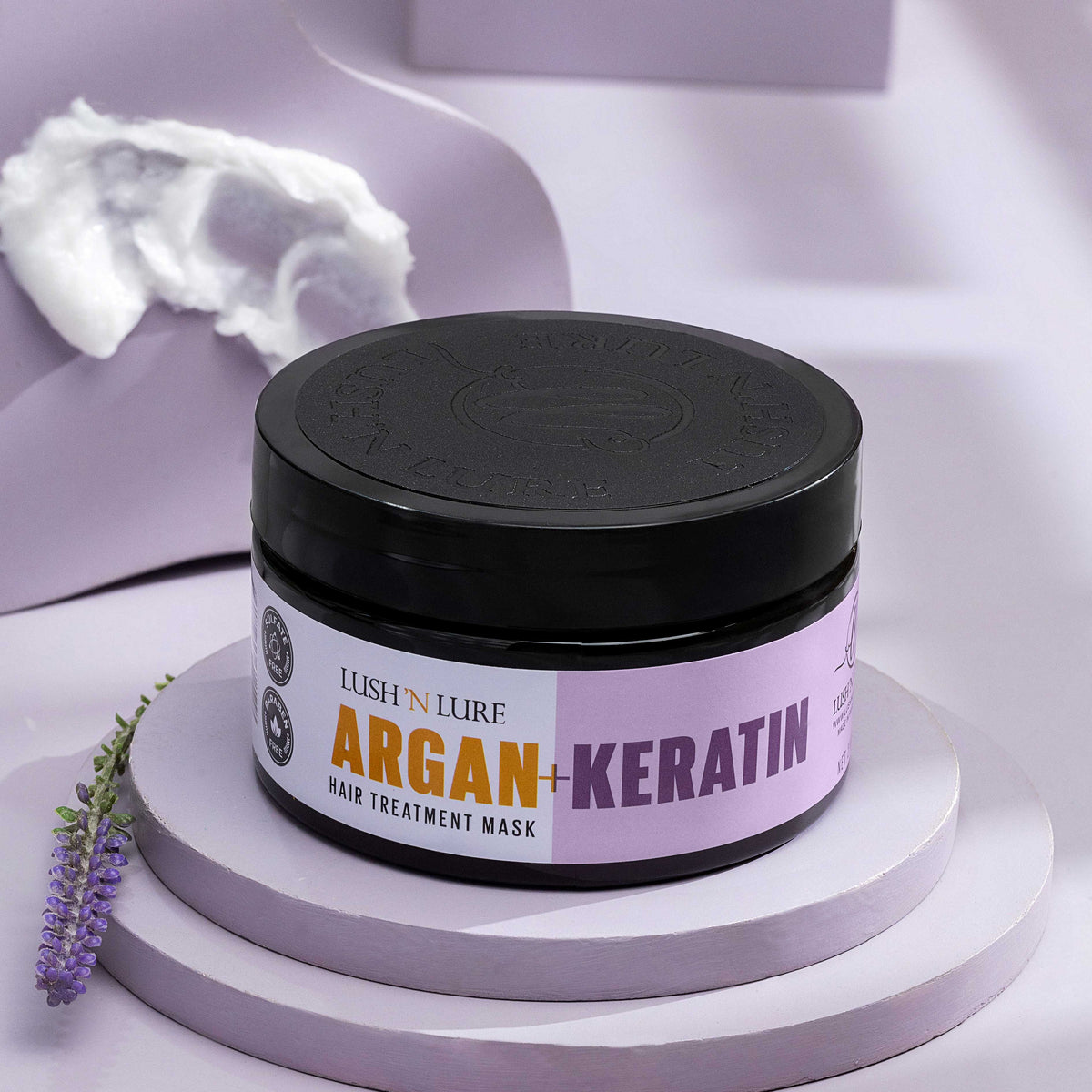 "LUSH 'N LURE Argan & Keratin Mask displayed elegantly against a soft background, highlighting its nourishing formula designed to deeply hydrate and restore hair health."