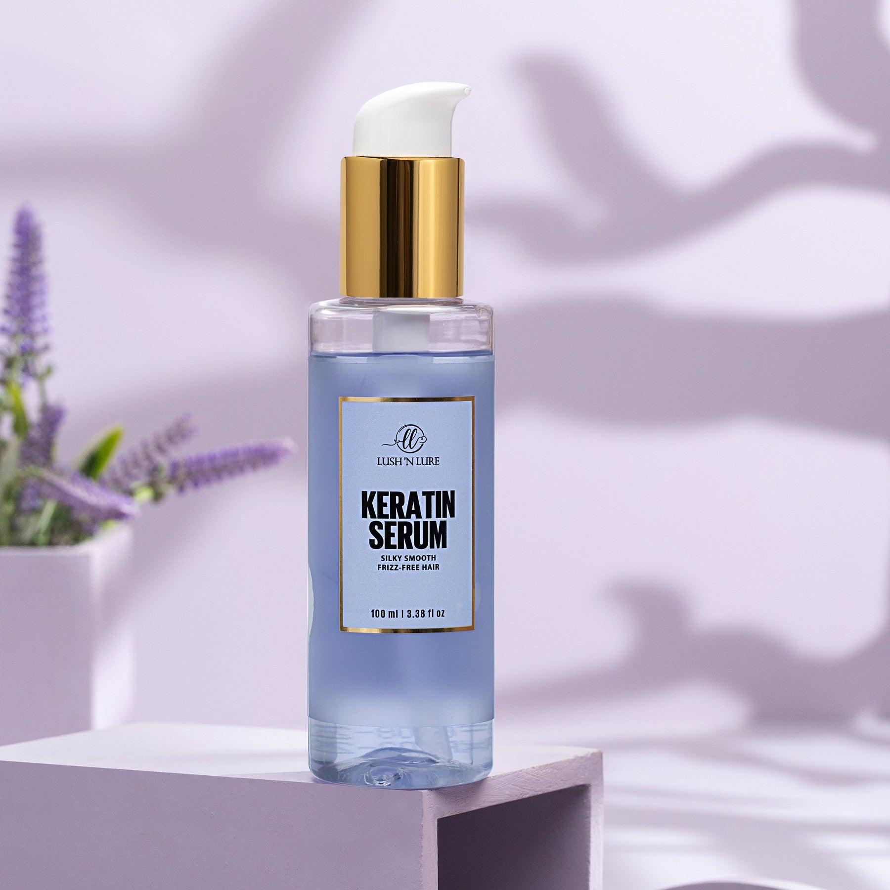 "LUSH 'N LURE Keratin Serum bottle displayed against a sleek background, highlighting its lightweight formula designed to smooth frizz and enhance shine for healthier-looking hair."