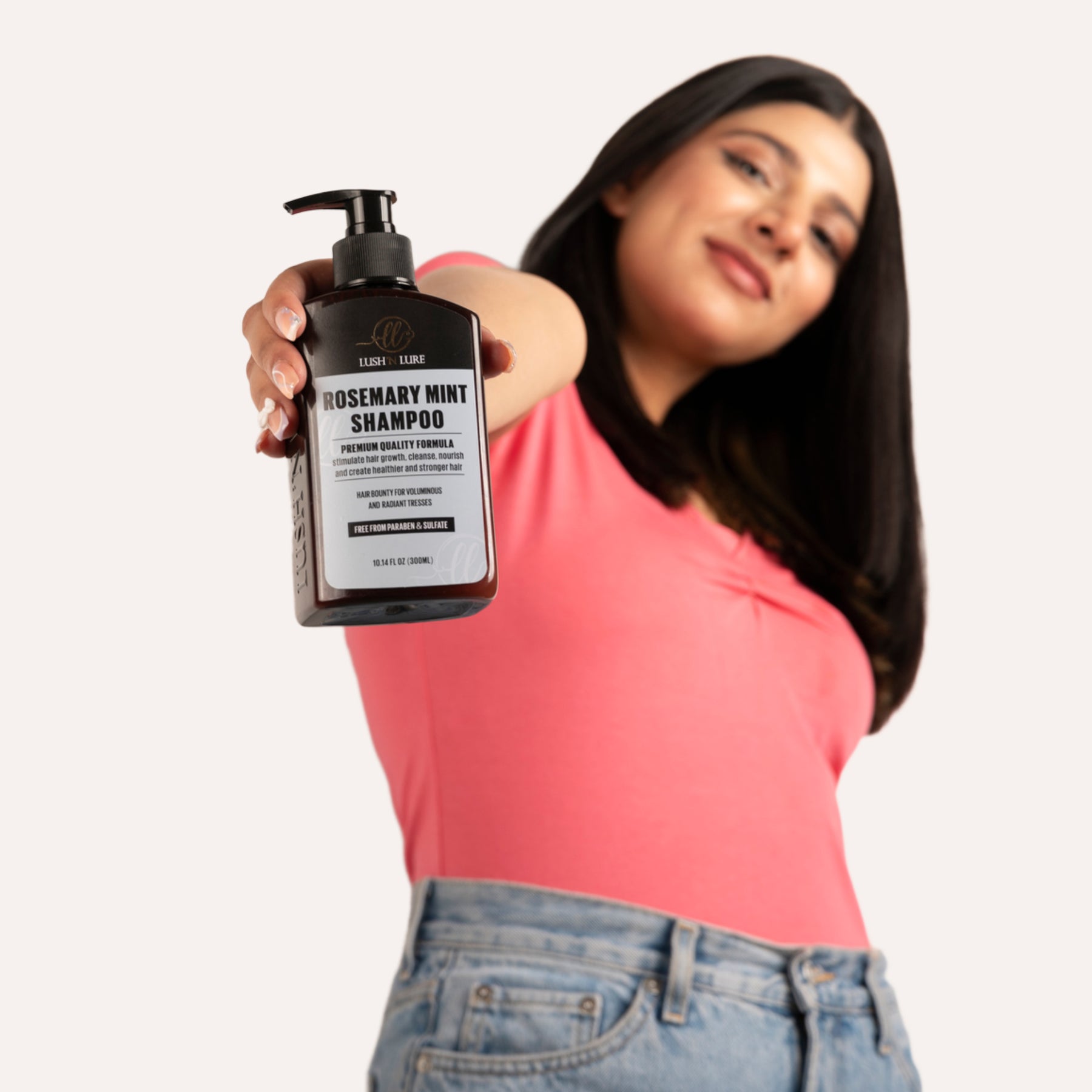 "Model washing her hair with LUSHNLURE Rosemary Mint Shampoo, highlighting its refreshing and invigorating formula. The shampoo cleanses the scalp while promoting healthy hair growth, leaving hair feeling revitalized, fresh, and full of volume."