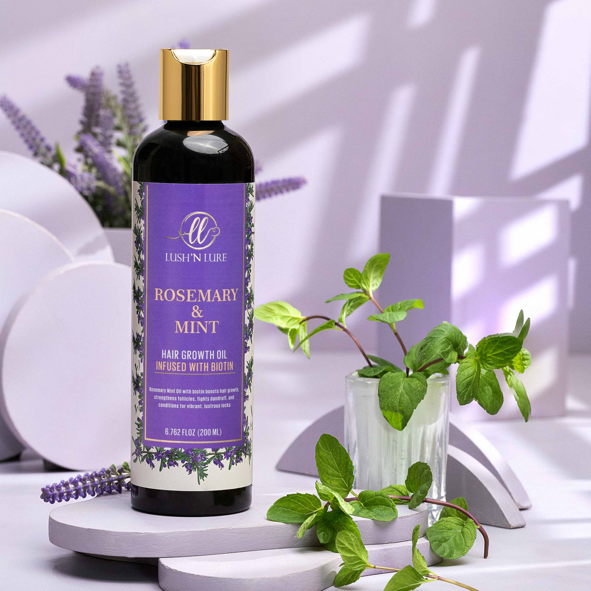 "LUSH 'N LURE Rosemary Oil displayed on a natural wooden surface with fresh rosemary sprigs, showcasing its nourishing properties for promoting hair growth and scalp health."