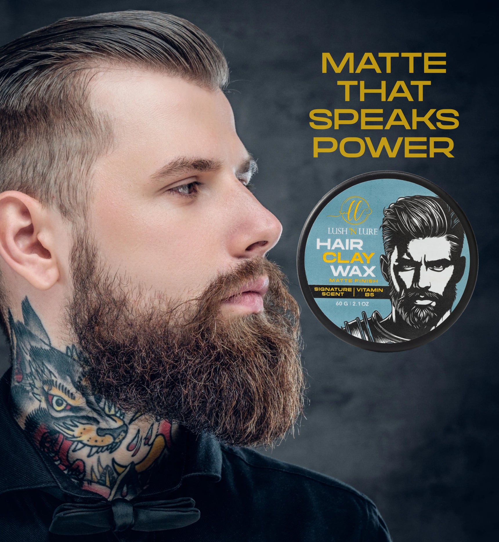 Man with beard and tattoos on a dark background with hair clay wax product.
