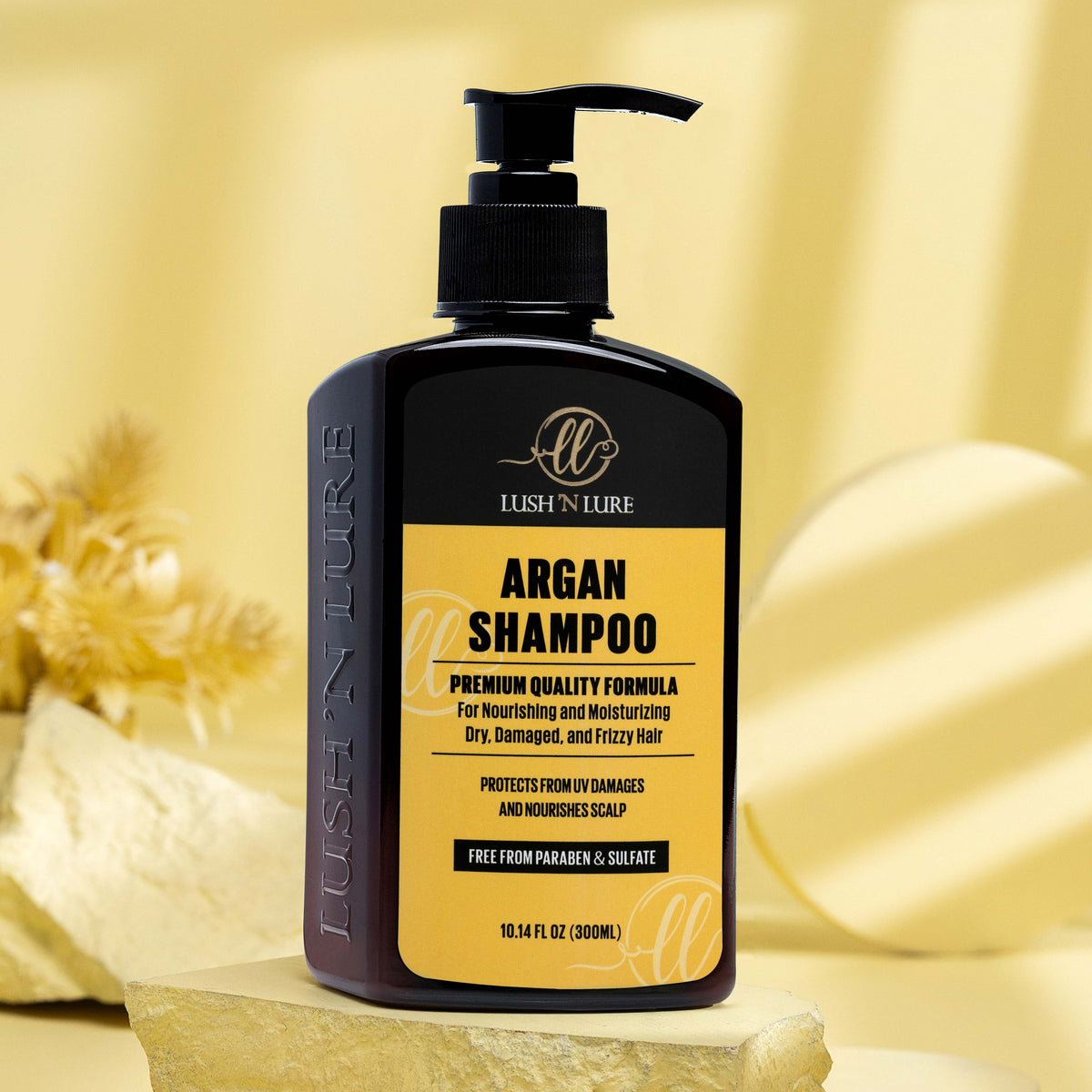 "LUSH 'N LURE Argan Shampoo displayed elegantly with a clean background, highlighting its nourishing formula designed to hydrate and strengthen hair."