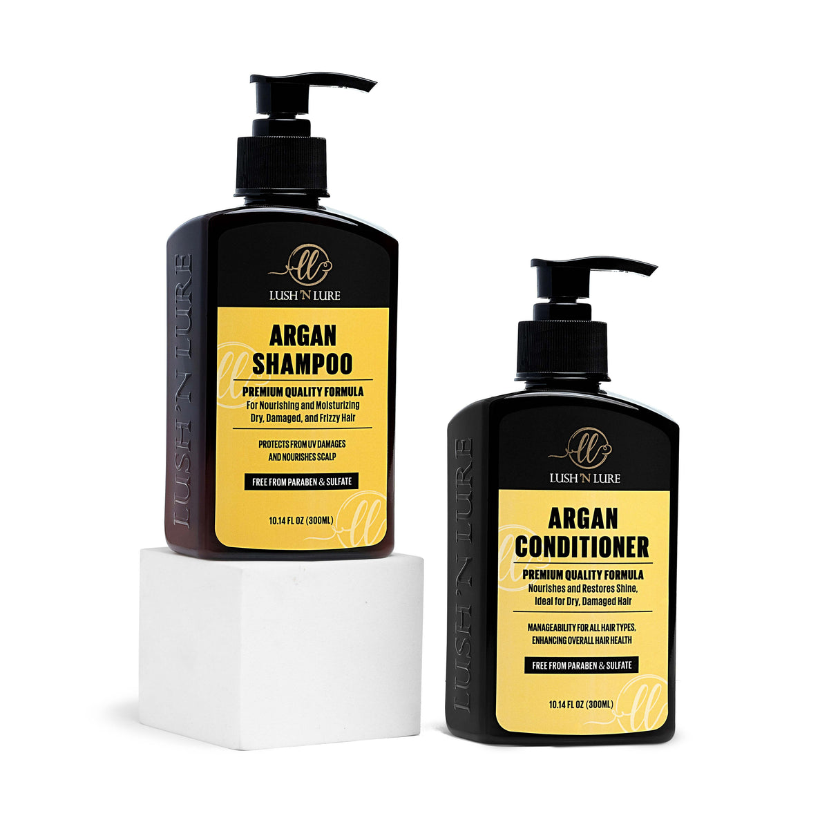 "LUSH 'N LURE Argan Shampoo and Conditioner duo displayed together with argan nuts and leaves, highlighting their nourishing formulas designed to hydrate and soften hair."