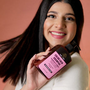 "Model washing her hair with LUSHNLURE Color Lock Shampoo, showcasing its vibrant color protection formula. The shampoo gently cleanses while preserving hair color, leaving it vibrant, glossy, and protected from fading."