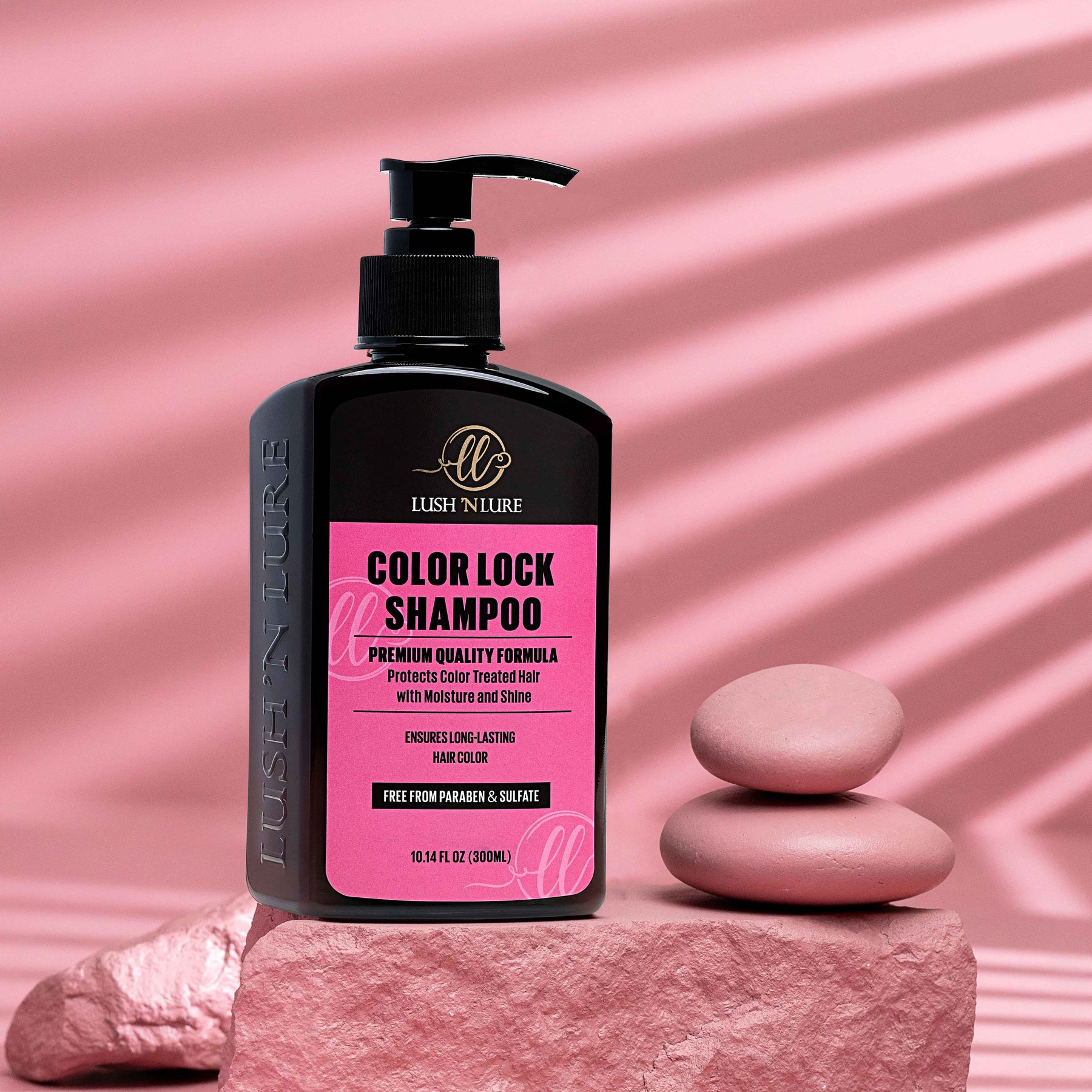 "LUSH 'N LURE Color Lock Shampoo bottle elegantly displayed with vibrant color accents and fresh flowers, emphasizing its formula designed to protect and preserve color-treated hair."