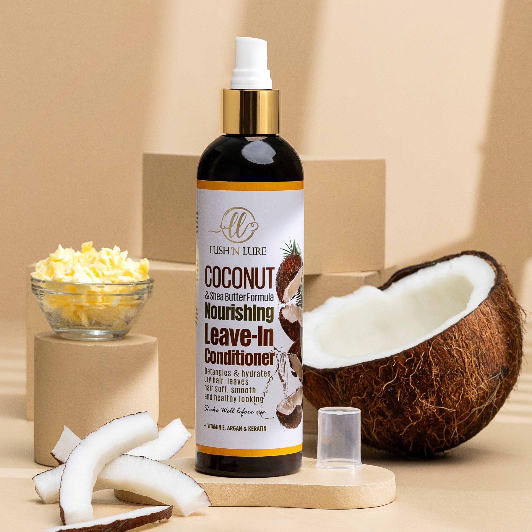 "LUSH 'N LURE Coconut Leave-In Conditioner Spray showcased with fresh coconut halves and tropical leaves, highlighting its hydrating formula designed for soft, manageable hair."