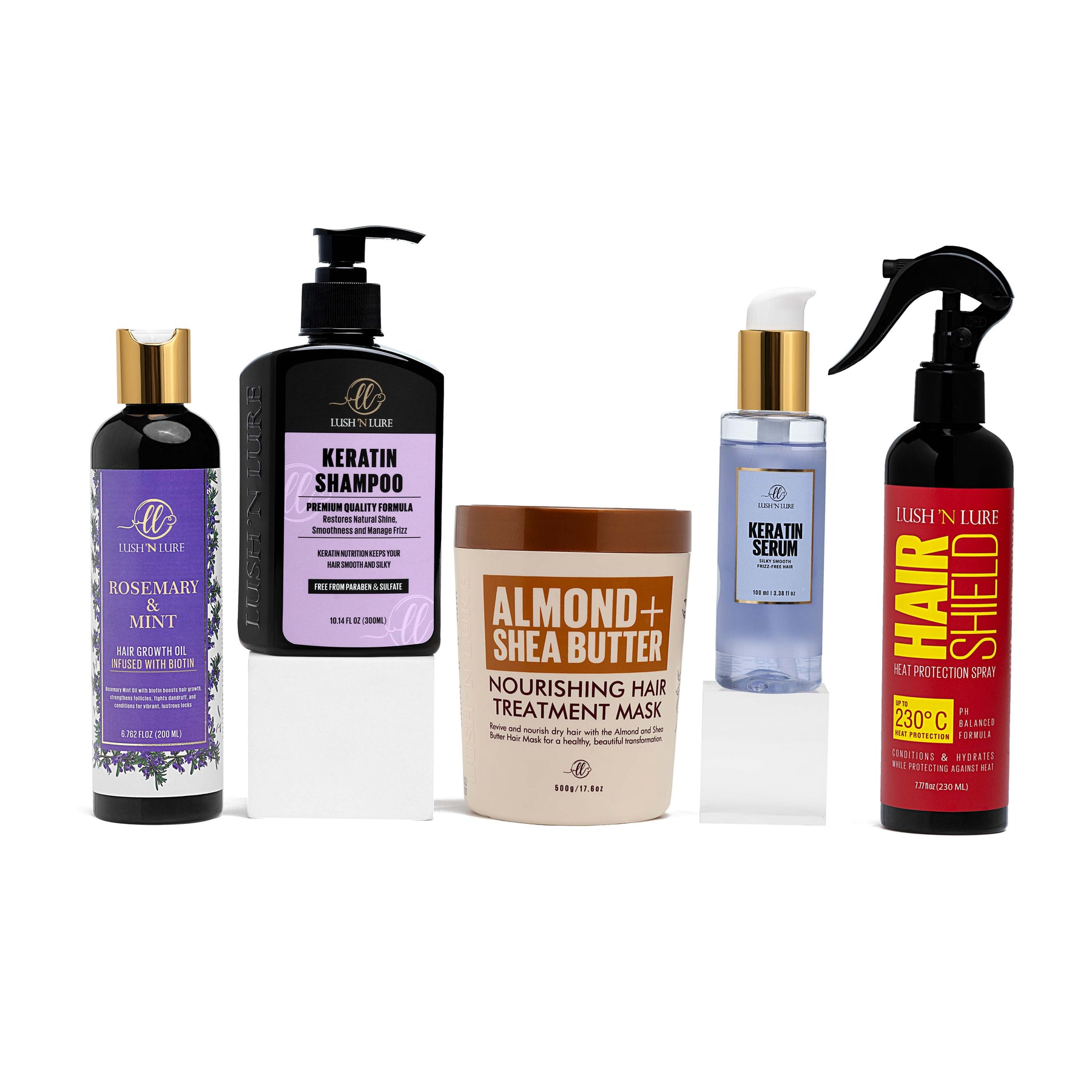 "LUSH 'N LURE Most Loved Products featuring Heat Protection Spray, Keratin Shampoo, Almond Mask, Keratin Serum, and Rosemary Oil arranged together, showcasing their effective formulas for healthy, nourished hair."